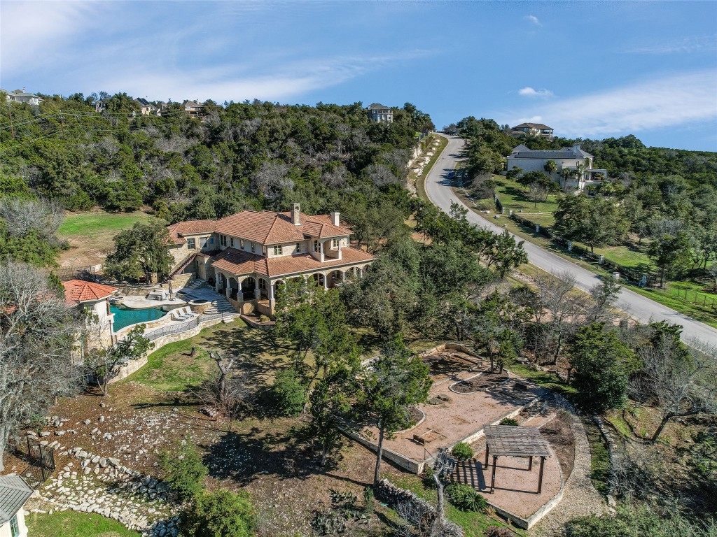 an aerial view of a house with a garden