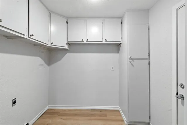 a view of a kitchen with a sink
