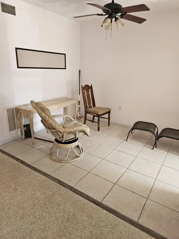 a view of a livingroom with furniture