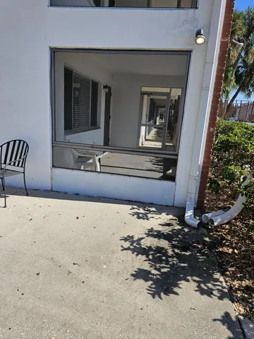 a view of a backyard of a house