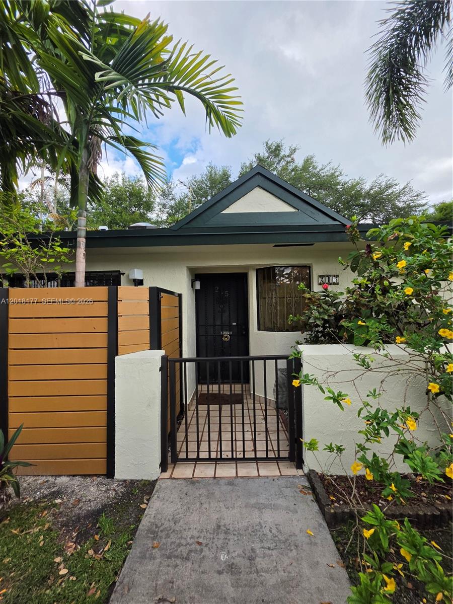 10908 Southwest 72nd Street, Unit 215 Miami, FL 33173 - Photo 11 of 25 a front view of a house with a porch
