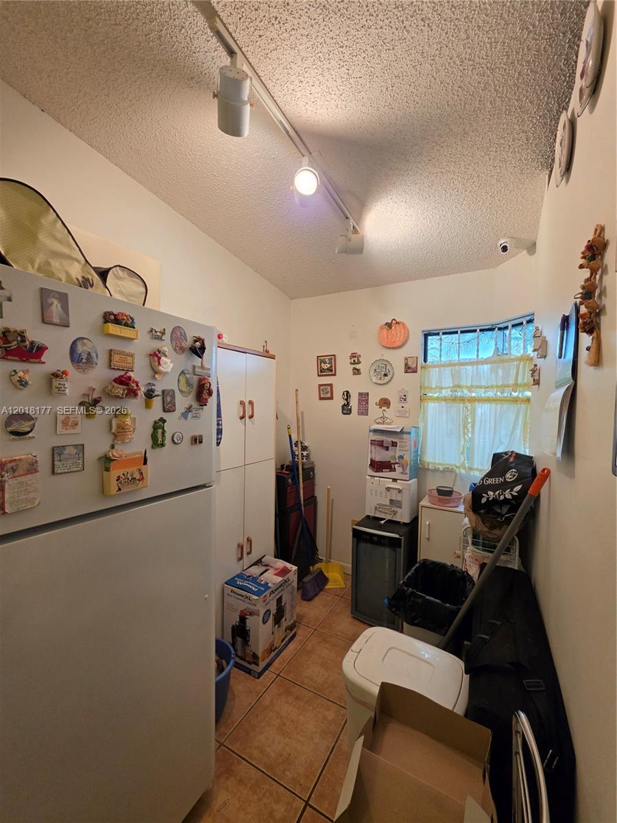 10908 Southwest 72nd Street, Unit 215 Miami, FL 33173 - Photo 12 of 25 a room with furniture and a window