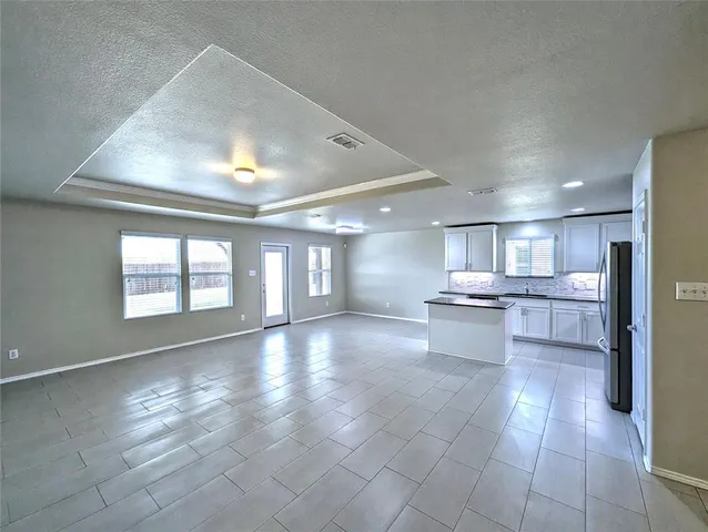 a large hall with outdoor seating