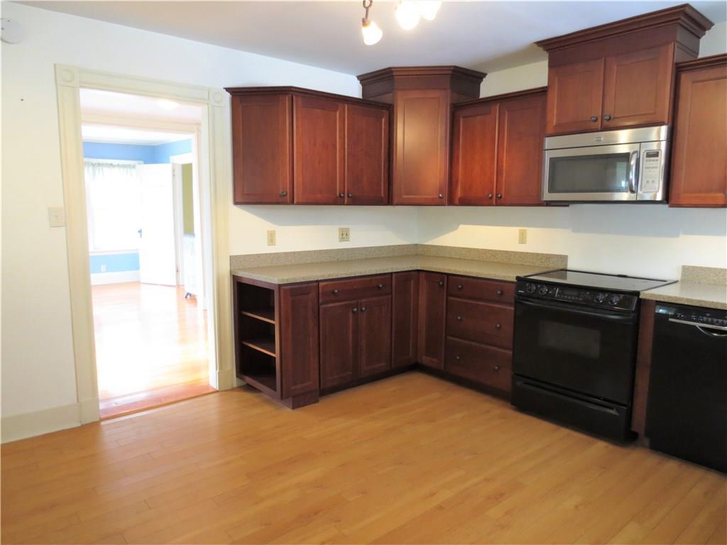 281 Duck Pond Road Westbrook, ME 04092 - Photo 6 of 20 Kitchen into Living Area