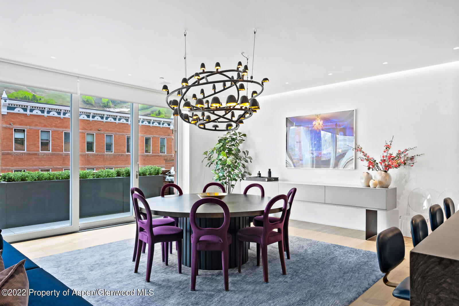 508 East Cooper Avenue, Unit 201 Aspen, CO 81611 - Photo 14 of 54 a view of a dining room with furniture