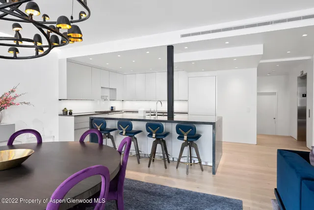 a view of kitchen and dining area with furniture