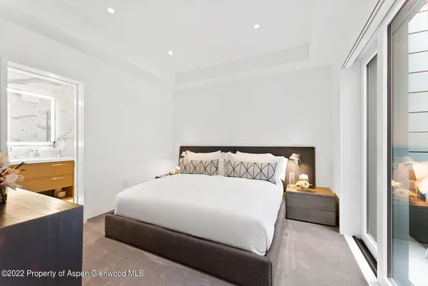 a room with furniture and a large window