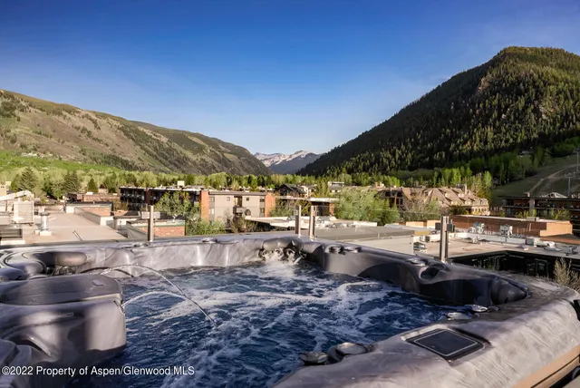a view of a terrace with sitting area