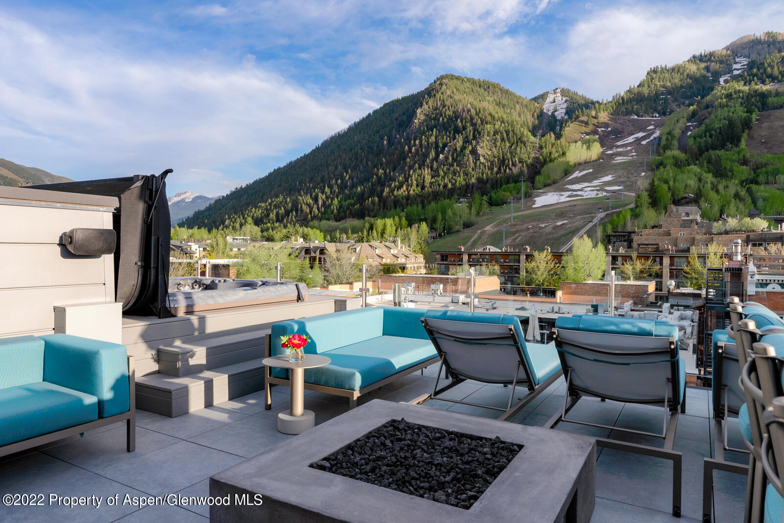 508 East Cooper Avenue, Unit 201 Aspen, CO 81611 - Photo 46 of 54 a outdoor living space with furniture and a fireplace