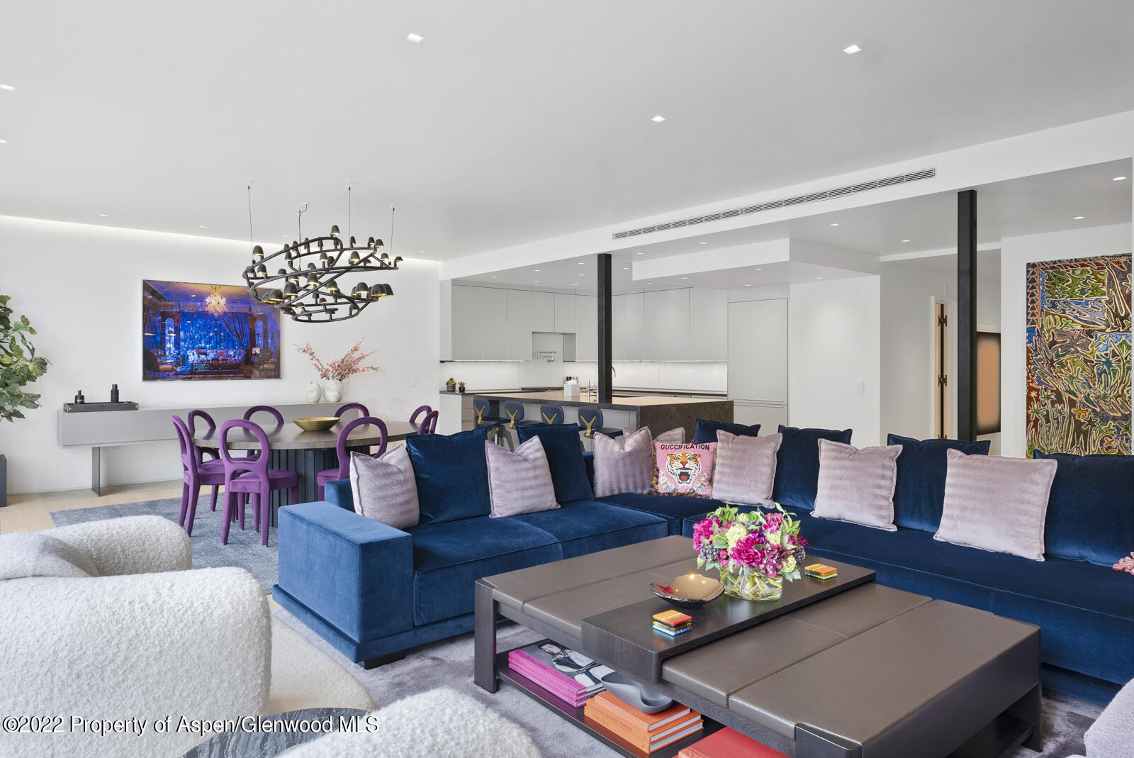 508 East Cooper Avenue, Unit 201 Aspen, CO 81611 - Photo 8 of 54 a living room with furniture and a chandelier