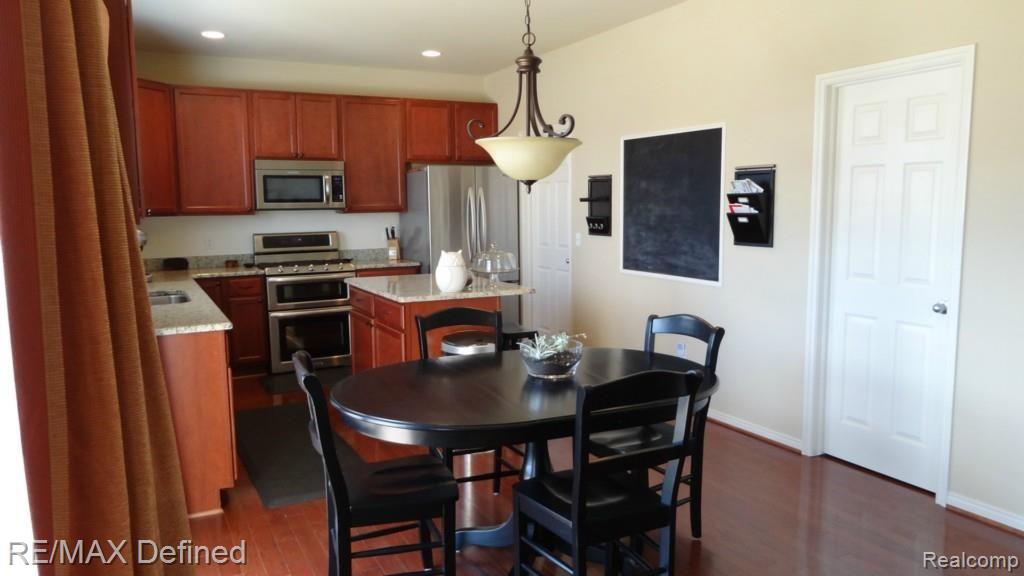 3254 Fantail Drive Rochester, MI 48309 - Photo 20 of 46 Kitchen showing pantry door and Laundry/Garage entrance door.