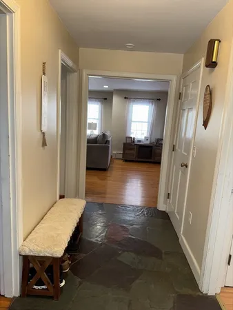 a view of a hallway with workspace