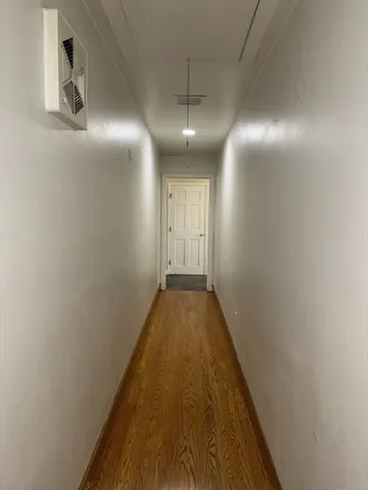a view of hallway with stairs