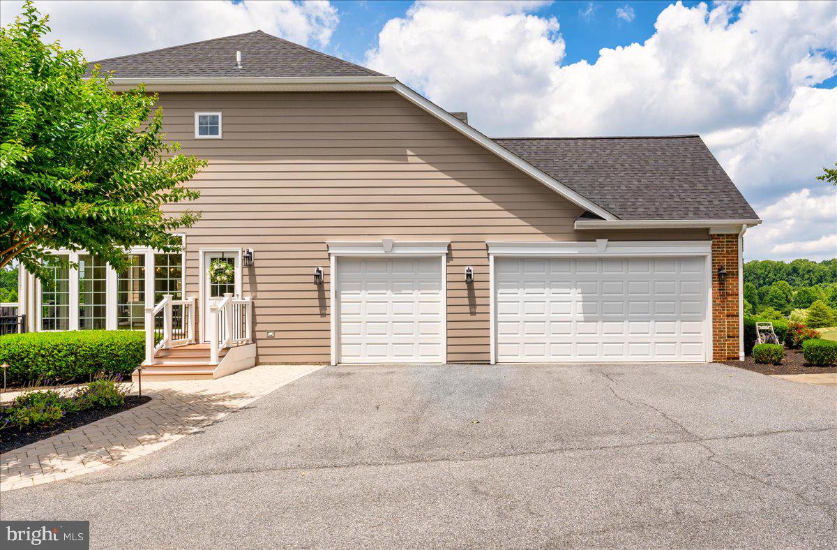 3208 Flagstick Drive Mount Airy, MD 21771 - Photo 94 of 135 3-car garage and entrance to mudroom
