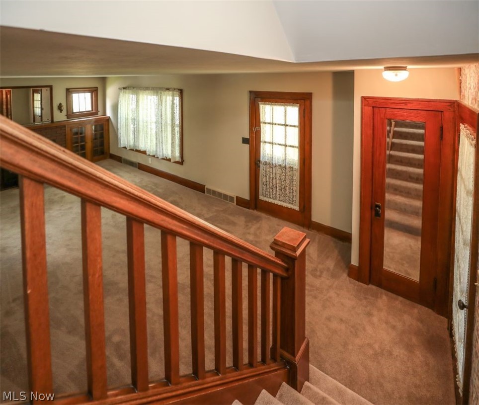 728 East Riddle Avenue Ravenna, OH 44266 - Photo 28 of 40 Stairs featuring carpet floors and lofted ceiling