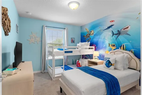 a bed room with a bed and a window