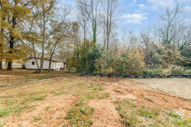 a view of empty space with trees