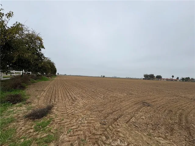 a view of an ocean beach and mountain