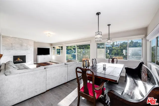 a kitchen with cabinets a sink and appliances