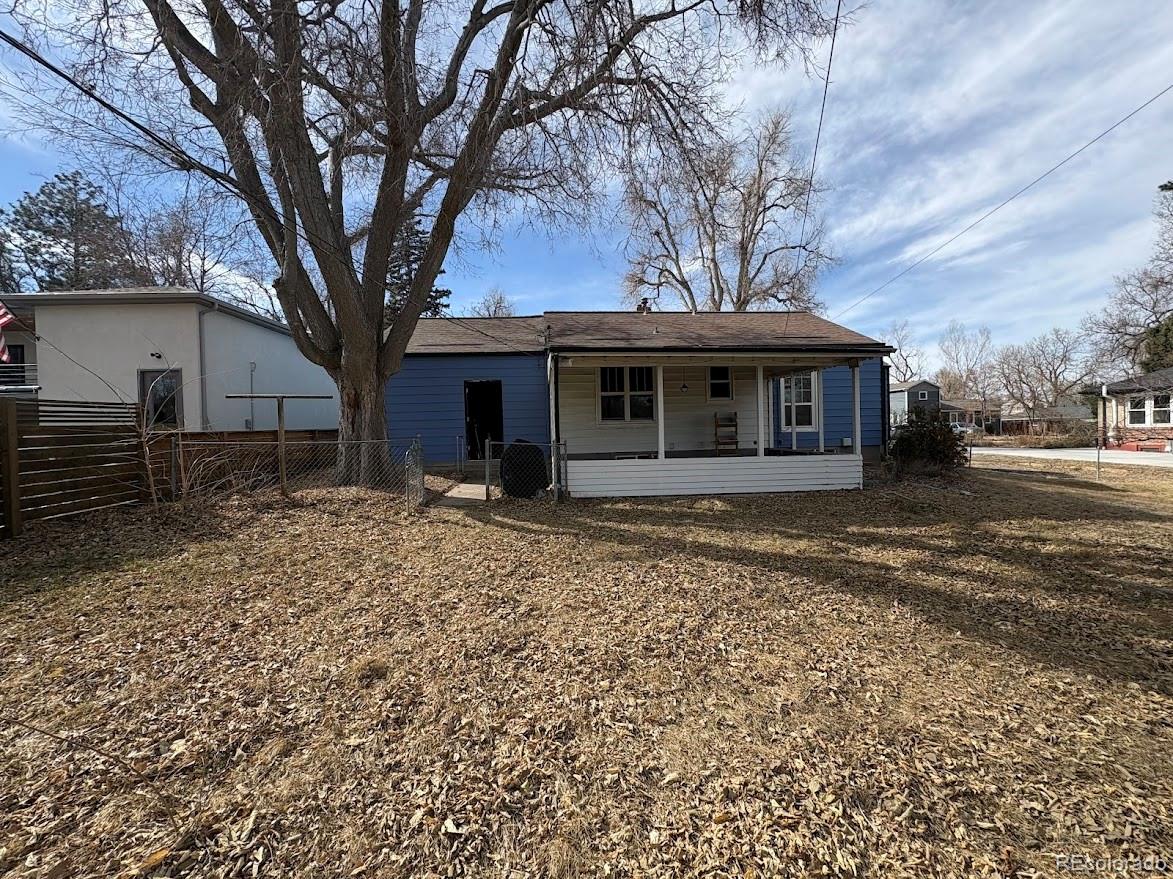 3520 High Court Wheat Ridge, CO 80033 - Photo 13 of 14 a front view of a house with garden