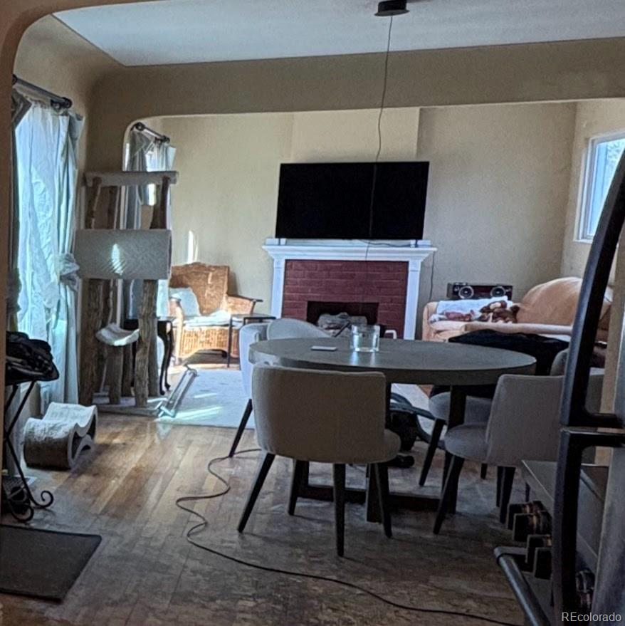 3520 High Court Wheat Ridge, CO 80033 - Photo 4 of 14 a dining room with furniture and wooden floor