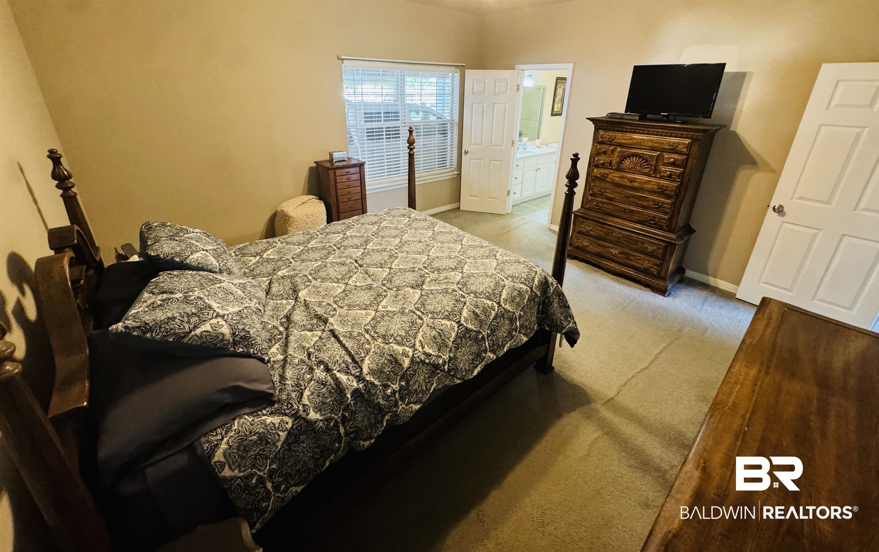 13795 White Road Silverhill, AL 36576 - Photo 44 of 99 Bedroom with light carpet and ensuite bath
