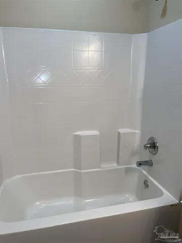 a bathroom with a bathtub