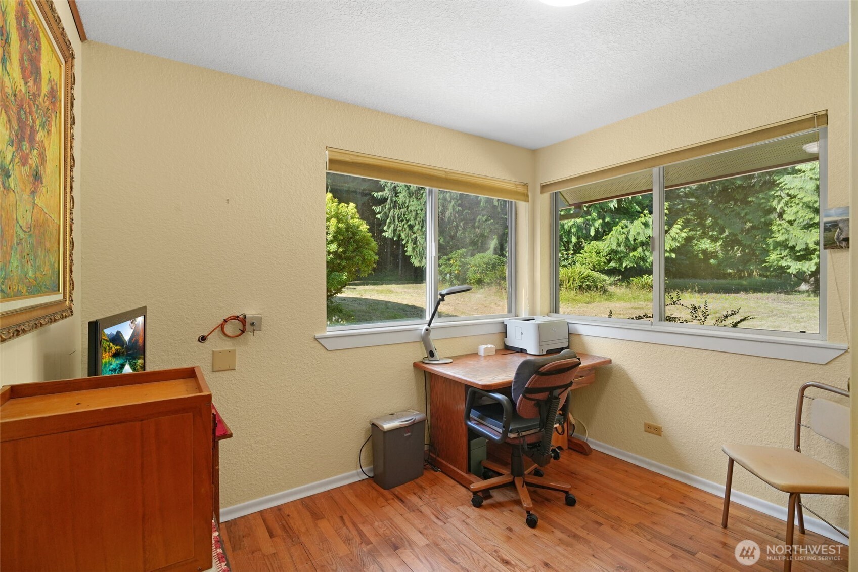 8815 Prather Road Southwest Centralia, WA 98531 - Photo 12 of 40 a view of a workspace with furniture and a window