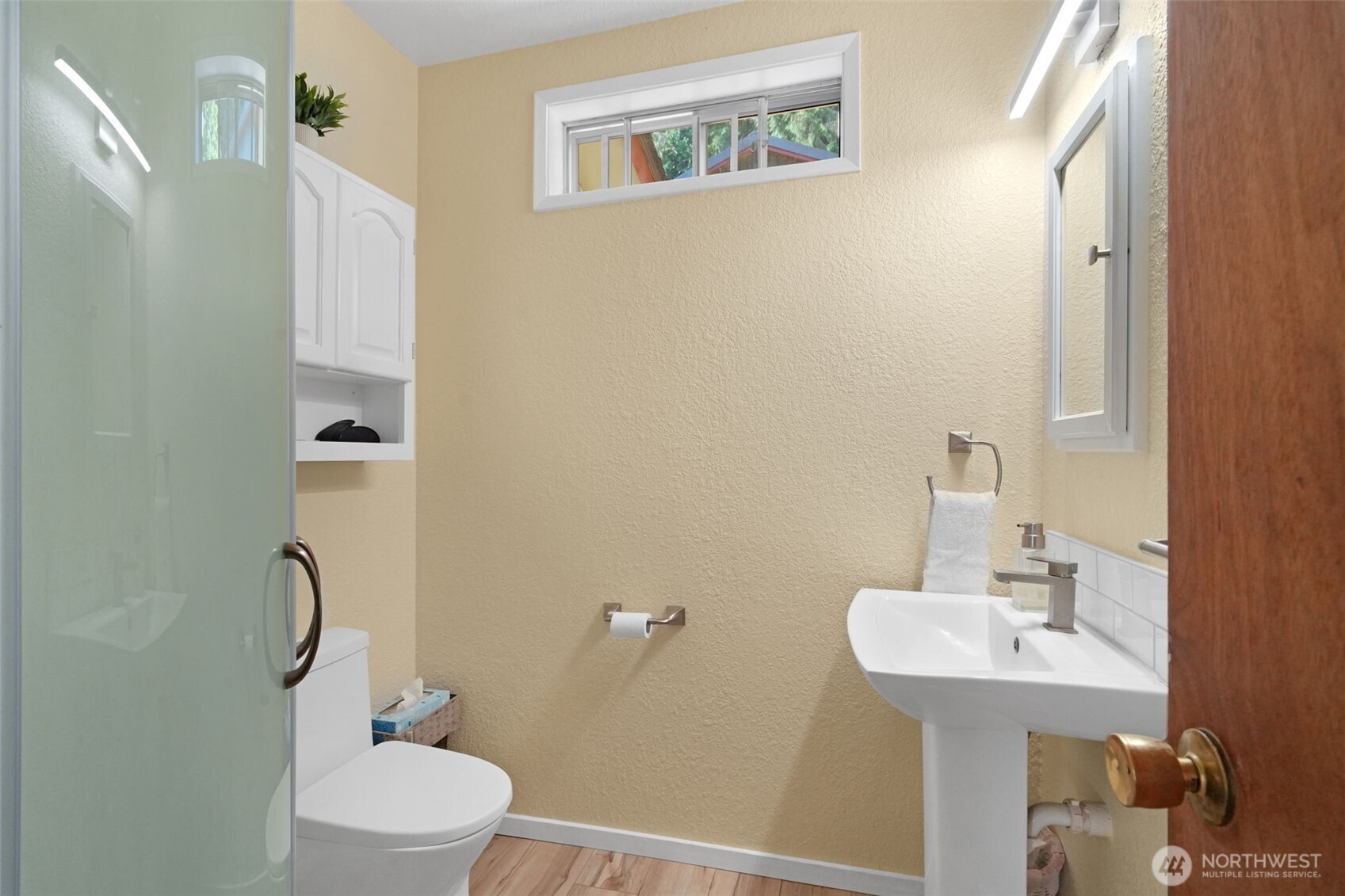 8815 Prather Road Southwest Centralia, WA 98531 - Photo 14 of 40 a bathroom with a sink a toilet and shower