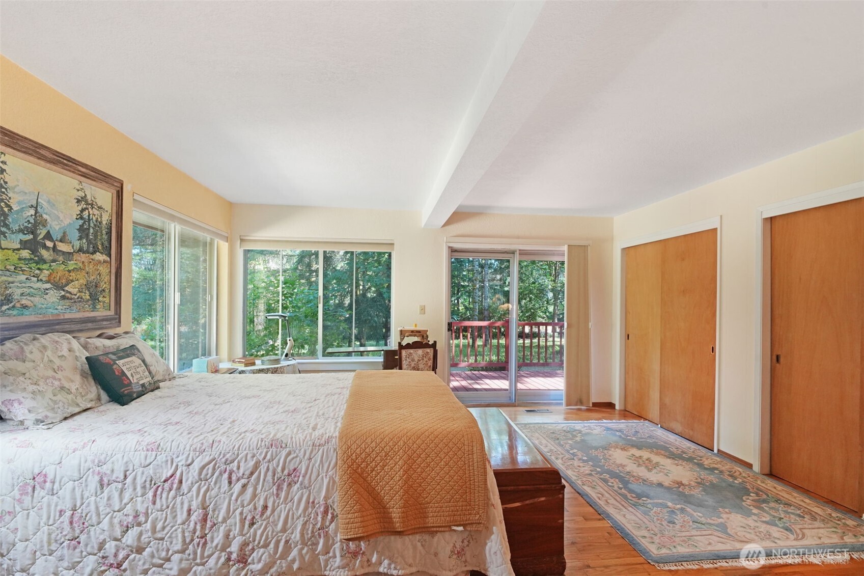 8815 Prather Road Southwest Centralia, WA 98531 - Photo 17 of 40 a bedroom with a large bed and a large window