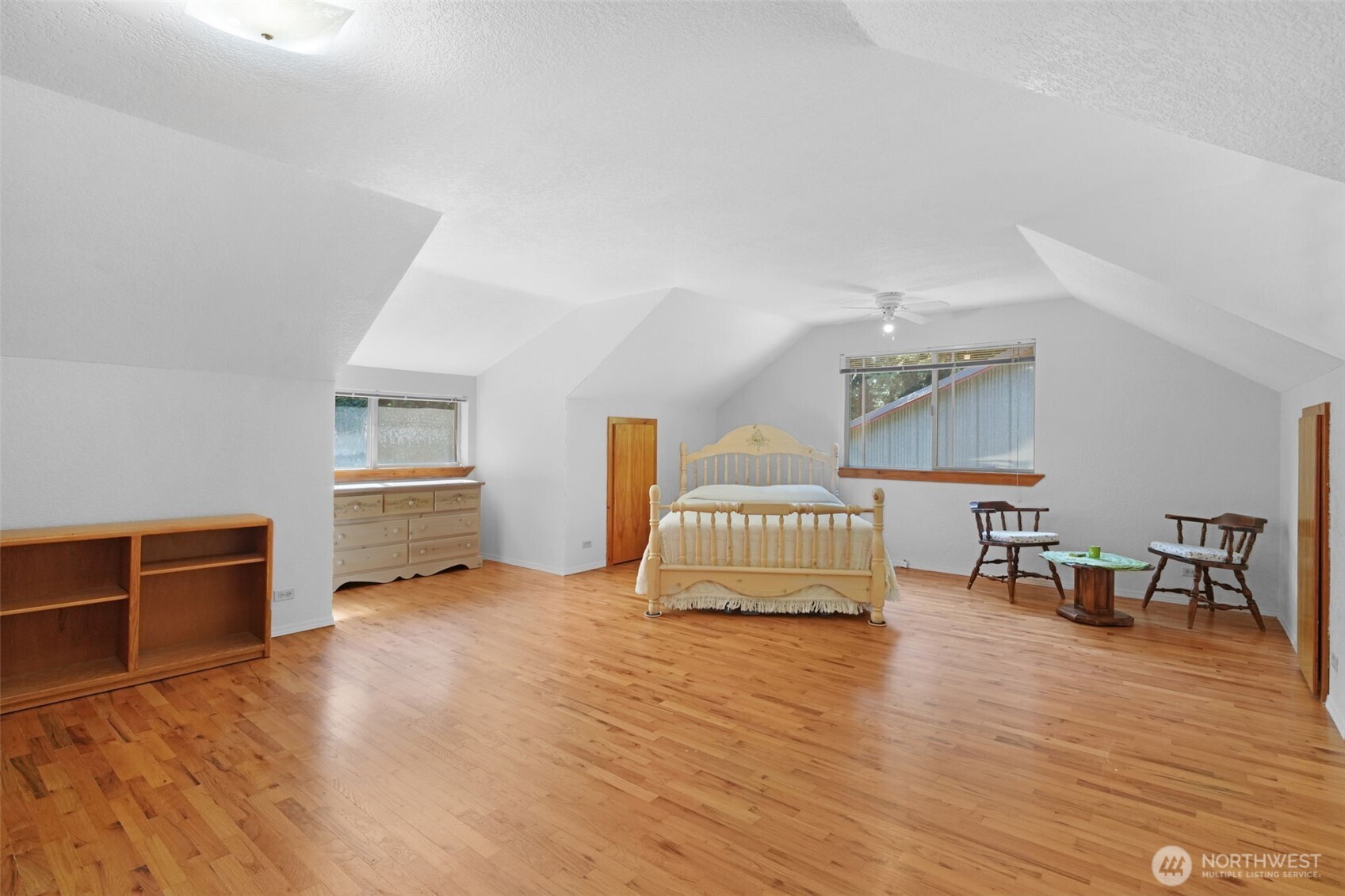 8815 Prather Road Southwest Centralia, WA 98531 - Photo 25 of 40 a living room with furniture and a wooden floor
