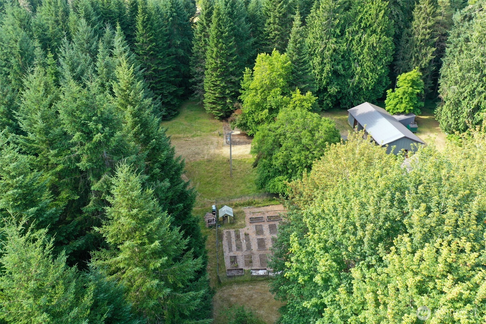 8815 Prather Road Southwest Centralia, WA 98531 - Photo 35 of 40 an aerial view of a house with a yard and garden