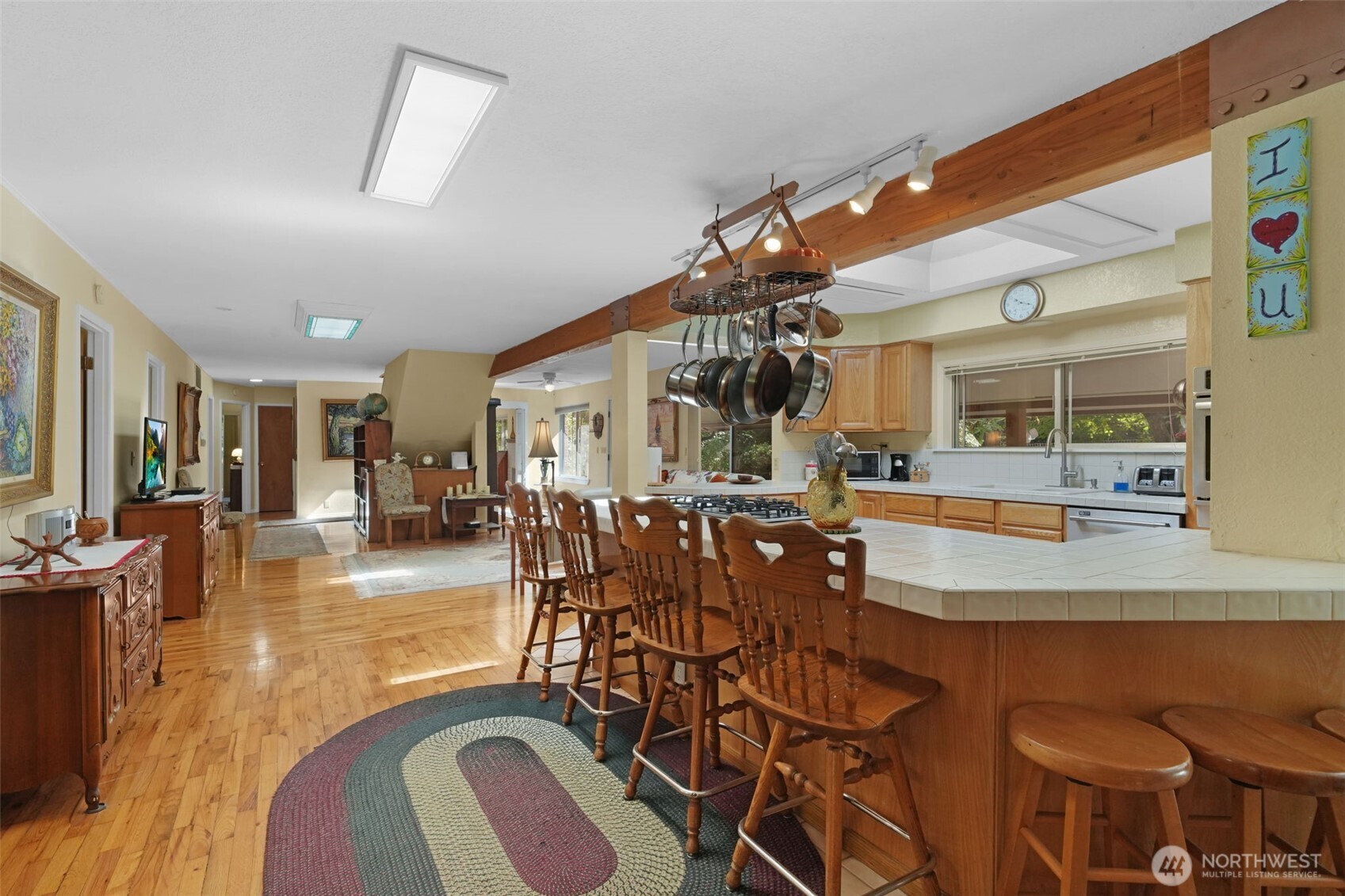 8815 Prather Road Southwest Centralia, WA 98531 - Photo 10 of 40 a view of a dining room kitchen with furniture and wooden floor