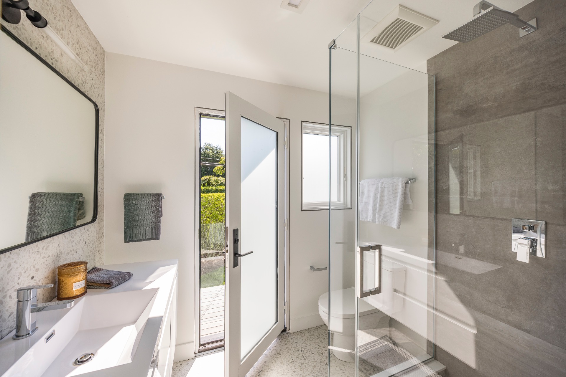 1076 Ocean Road Bridgehampton, NY 11932 - Photo 20 of 35 a bathroom with a tub and shower