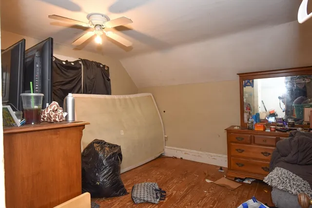 a room with furniture and lamp