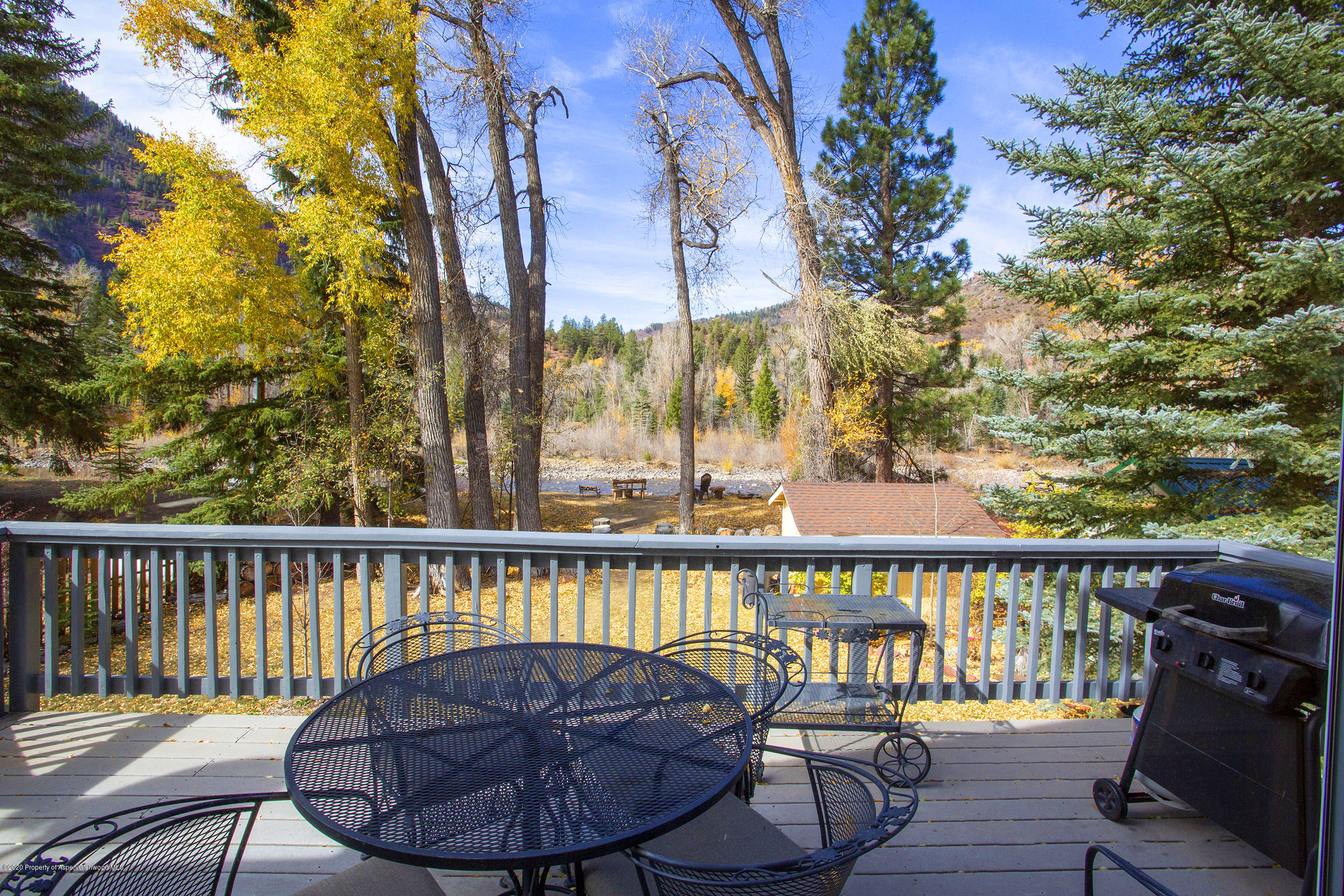 385 Redstone Boulevard Redstone, CO 81623 - Photo 12 of 36 a view of a chairs and table in the balcony