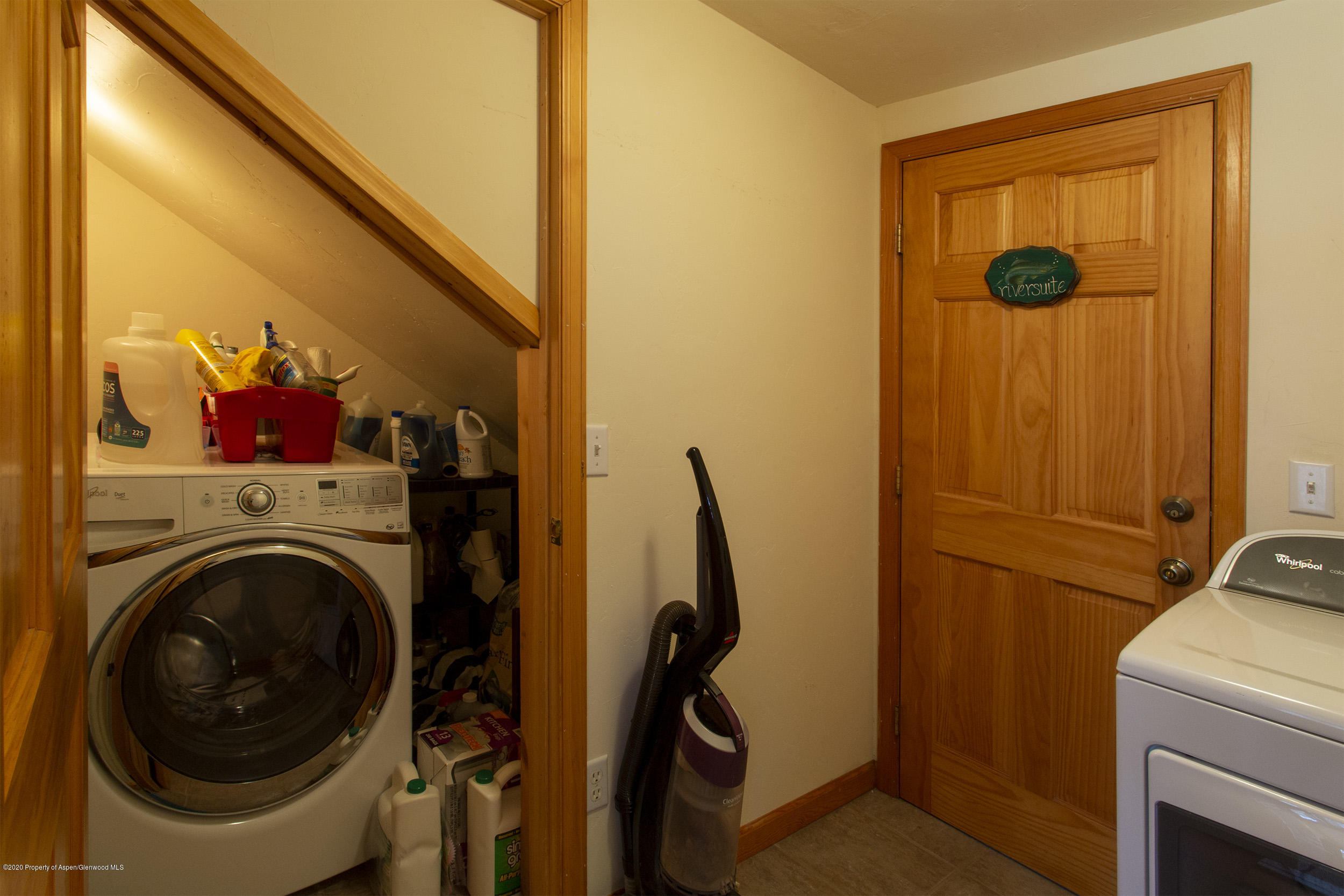 385 Redstone Boulevard Redstone, CO 81623 - Photo 33 of 36 a view of a storage and utility room with washer and dryer