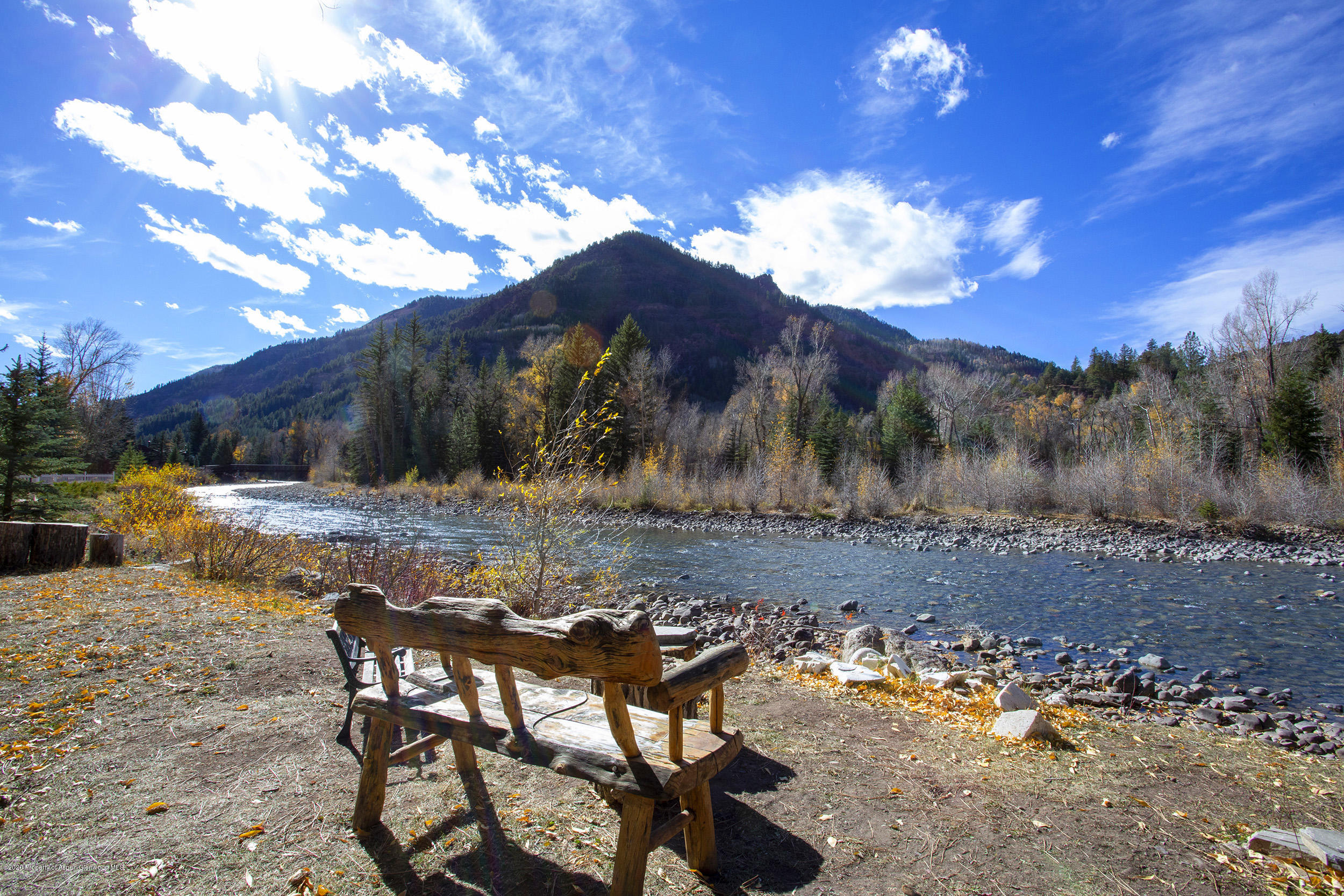 385 Redstone Boulevard Redstone, CO 81623 - Photo 35 of 36 a view of a backyard with large trees