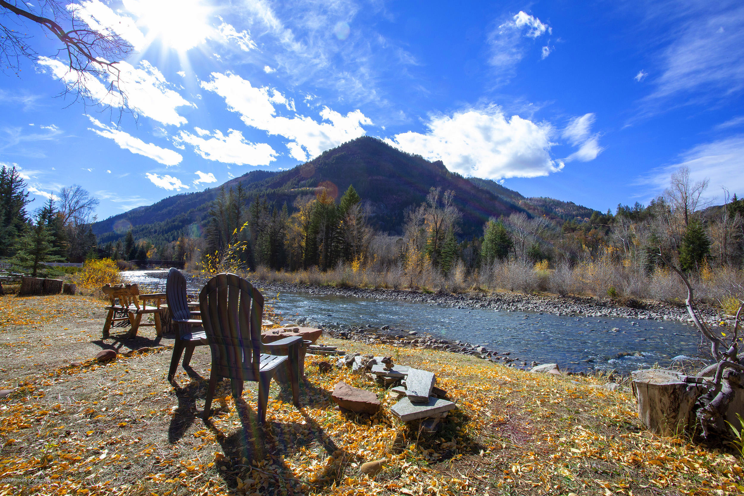 385 Redstone Boulevard Redstone, CO 81623 - Photo 7 of 36 a view of a backyard with sitting area