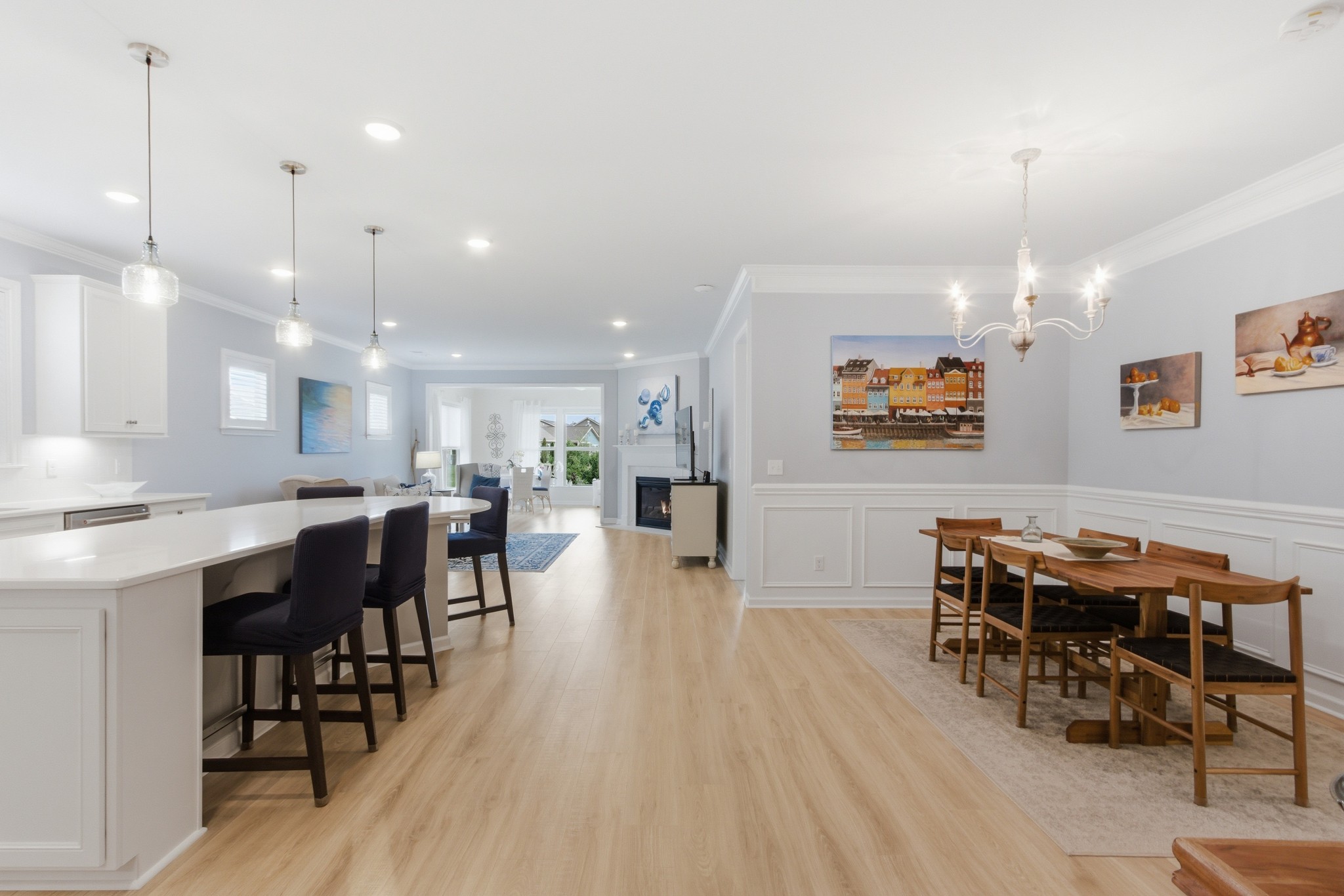 2321 Lawrence Ridge Spring Hill, TN 37174 - Photo 10 of 59 a view of a dining room and livingroom with furniture wooden floor kitchen chandelier