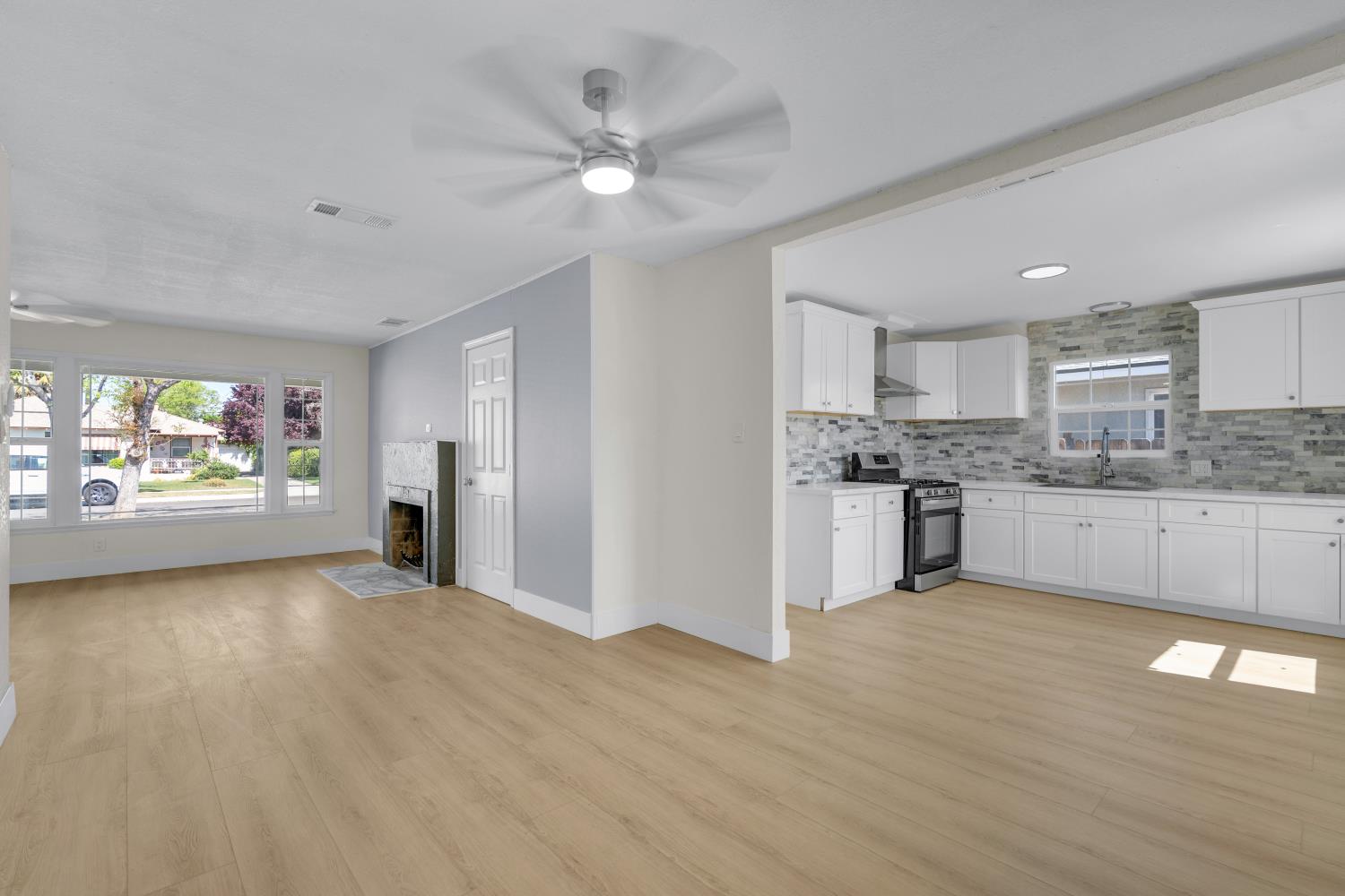 535 West Terrace Avenue Fresno, CA 93705 - Photo 11 of 18 a view of kitchen with wooden floor