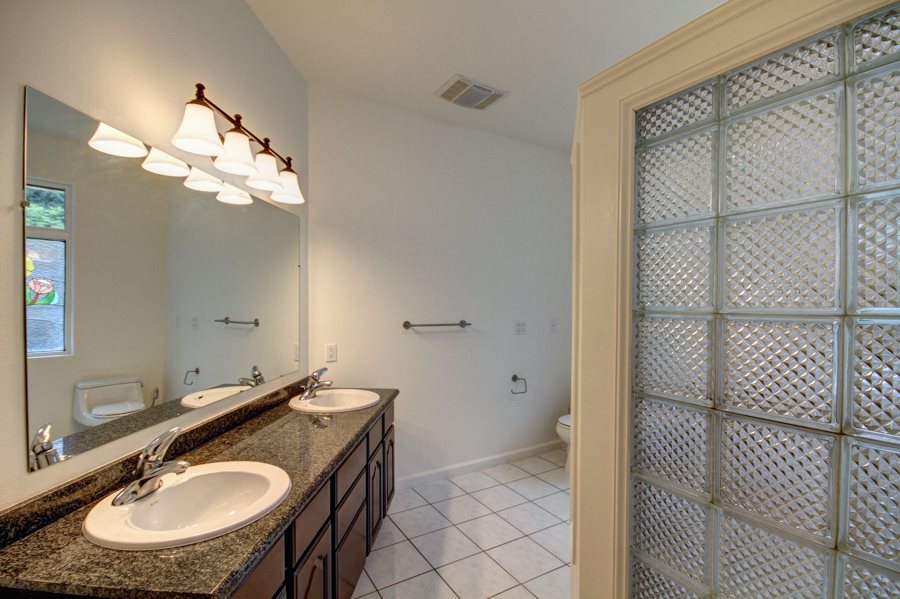 729 Alae Road Kula, HI 96790 - Photo 16 of 30 a bathroom with a sink and a mirror