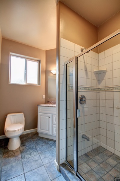 729 Alae Road Kula, HI 96790 - Photo 23 of 30 a bathroom with a toilet sink and shower