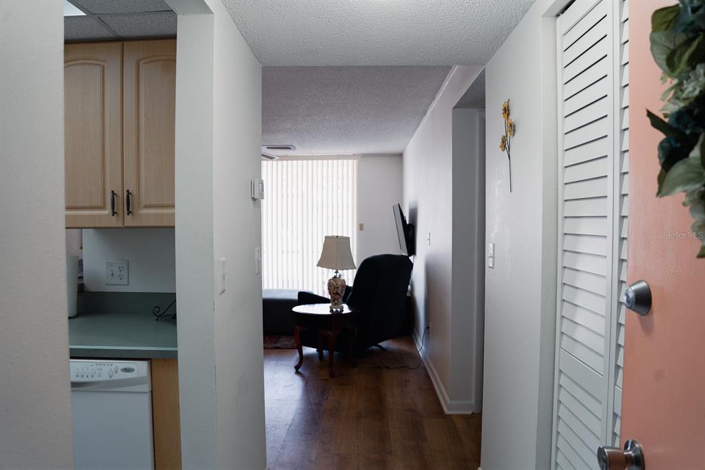 519 Albee Farm Road, Unit 110 Venice, FL 34285 - Photo 4 of 33 a view of workspace with wooden floor