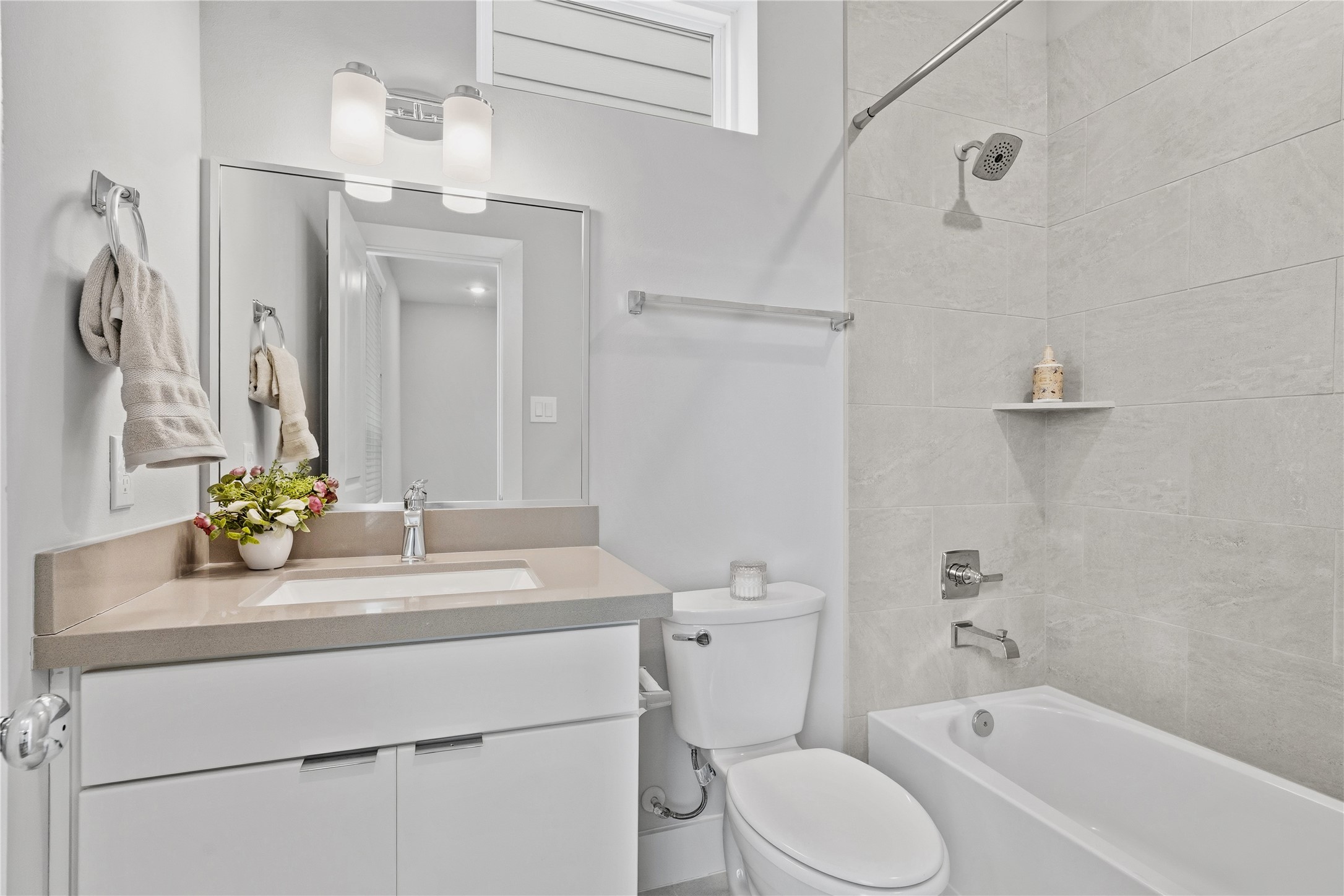 1284 North Post Oak Road, Unit B Houston, TX 77055 - Photo 31 of 37 Modern ensuite bathroom attached to the third bedroom.