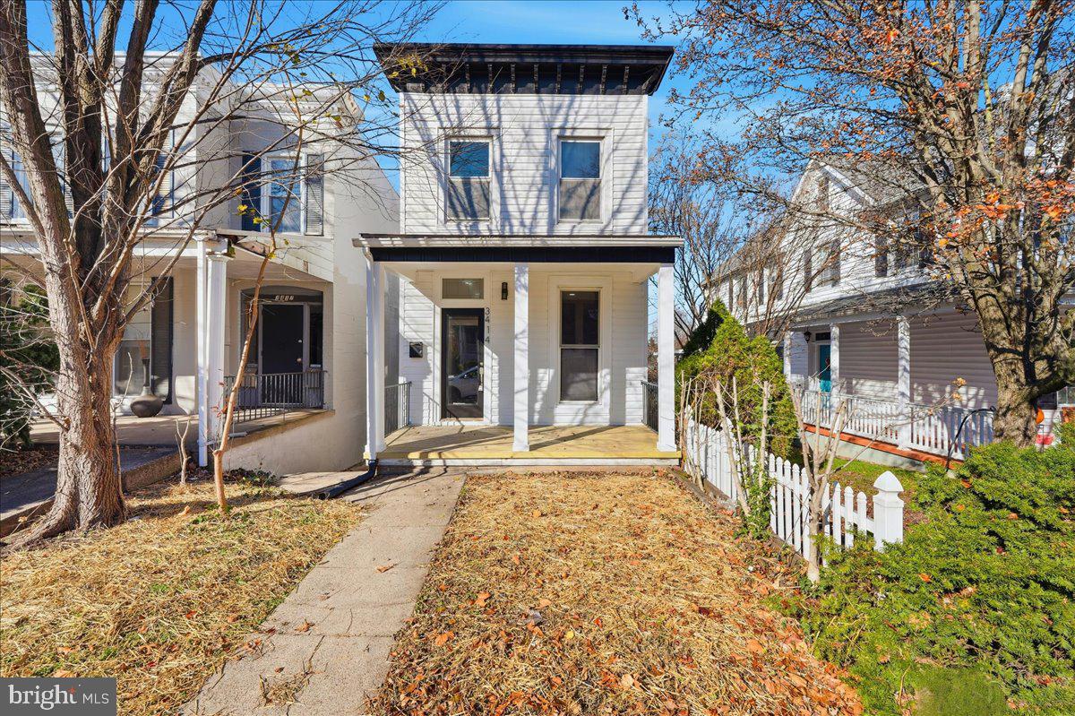 3414 Harford Road Baltimore, MD 21218 - Photo 1 of 32 a front view of a house with a porch