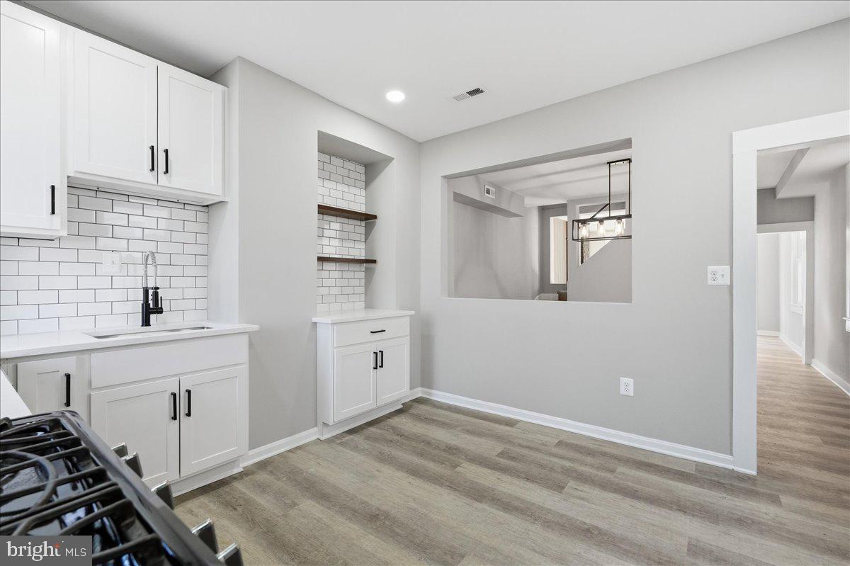3414 Harford Road Baltimore, MD 21218 - Photo 14 of 32 a view of a kitchen with electric appliances