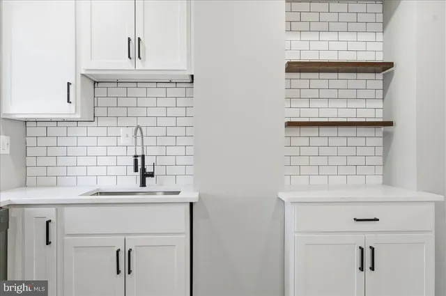 a bathroom with a sink and a bathtub
