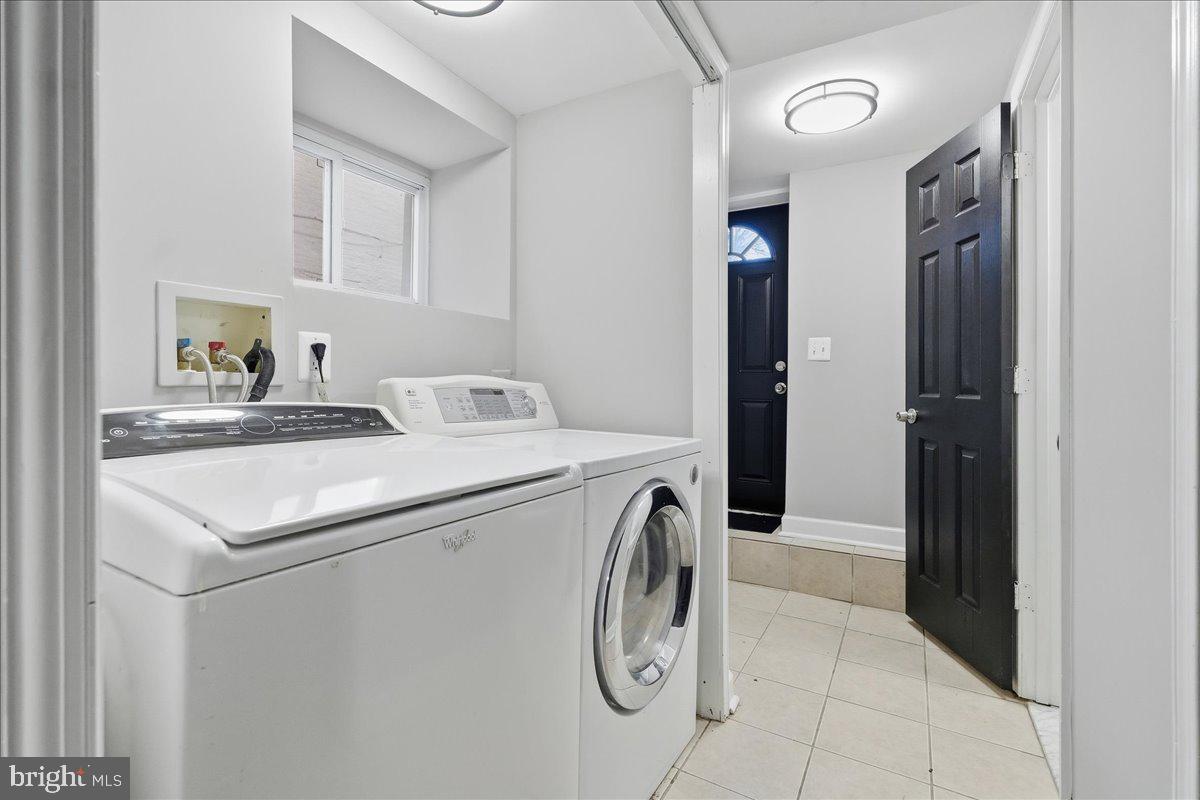 3414 Harford Road Baltimore, MD 21218 - Photo 29 of 32 a utility room with dryer and washer