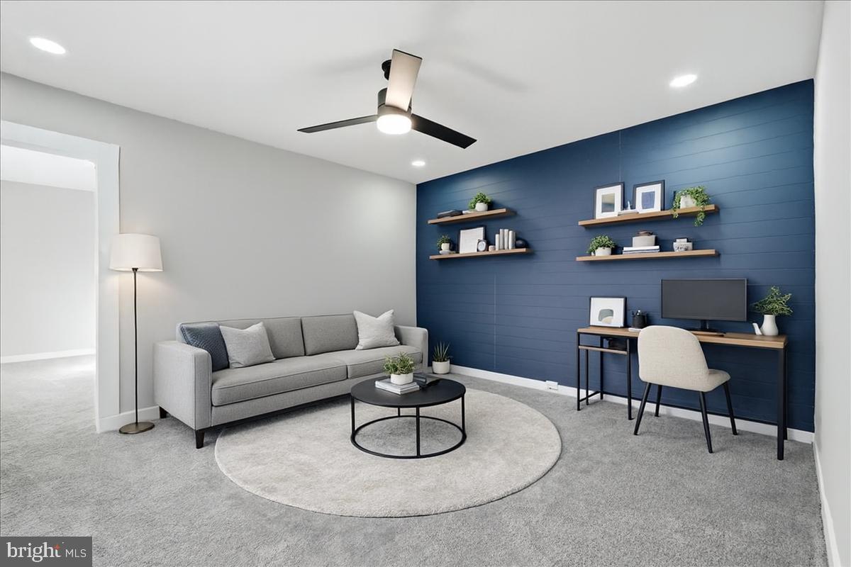 3414 Harford Road Baltimore, MD 21218 - Photo 6 of 32 a living room with furniture and a chandelier